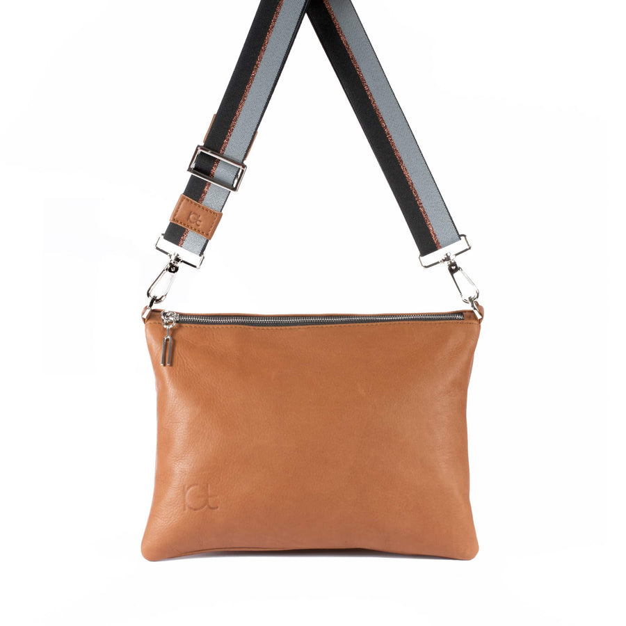 Leather Bag Sella color cognc  handmade with an elastic shoulder strap 